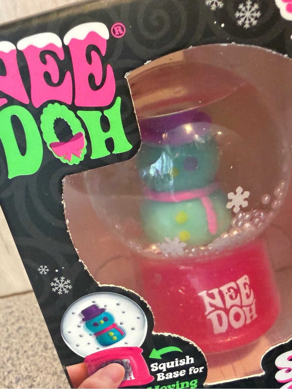 NeeDoh Pink Snow Globe Squishy Toy with Teal Snowman